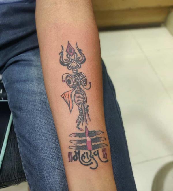 trishul forearm tattoo
