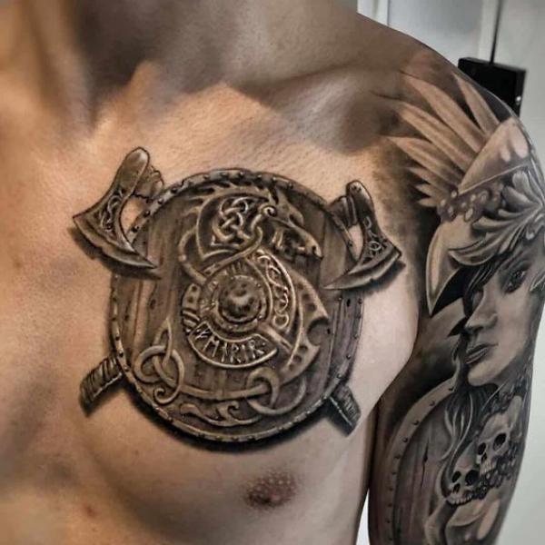 viking axe and shield tattoo chest