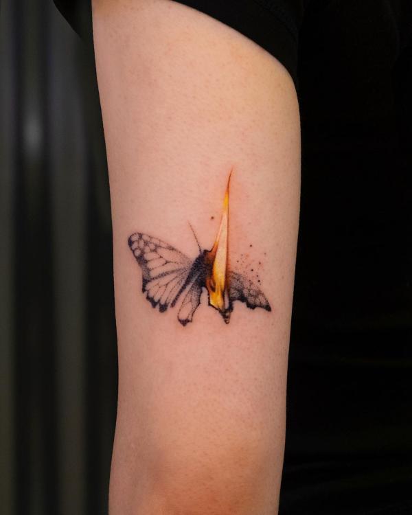 A burning butterfly tattoo