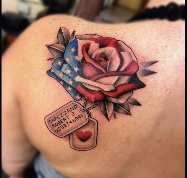 American flag rose with dog tag tattoo shoulder blade