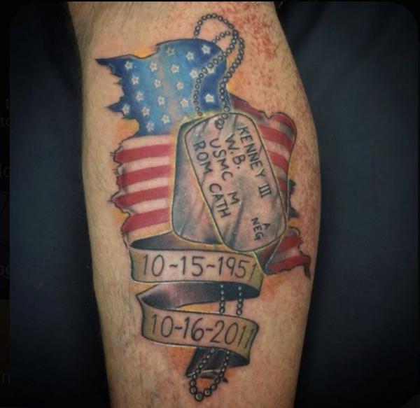 American flag with dog tag and dates tattoo