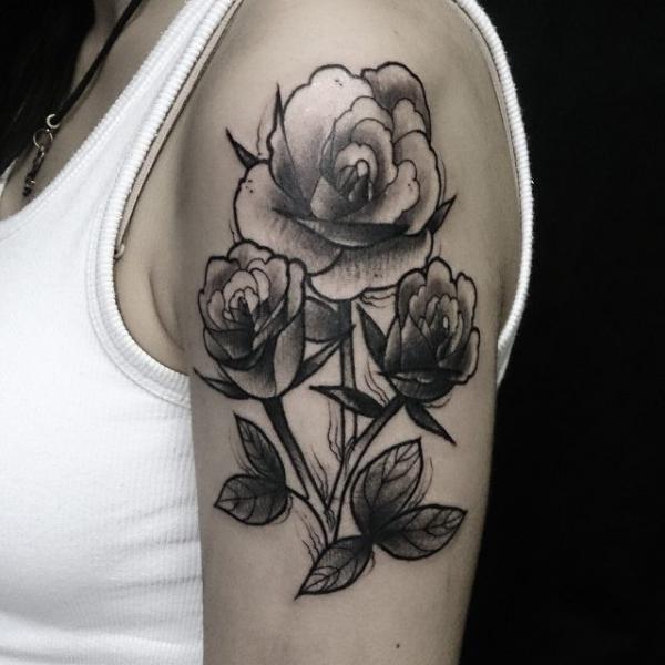 Black and white rose half sleeve tattoo