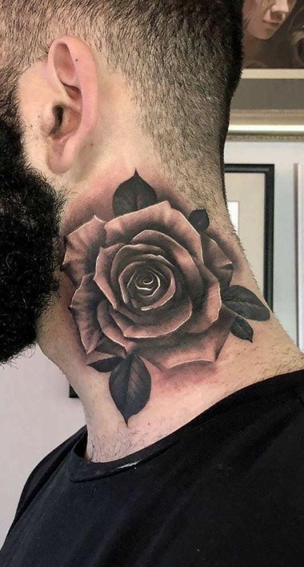 Black and white rose tattoo neck