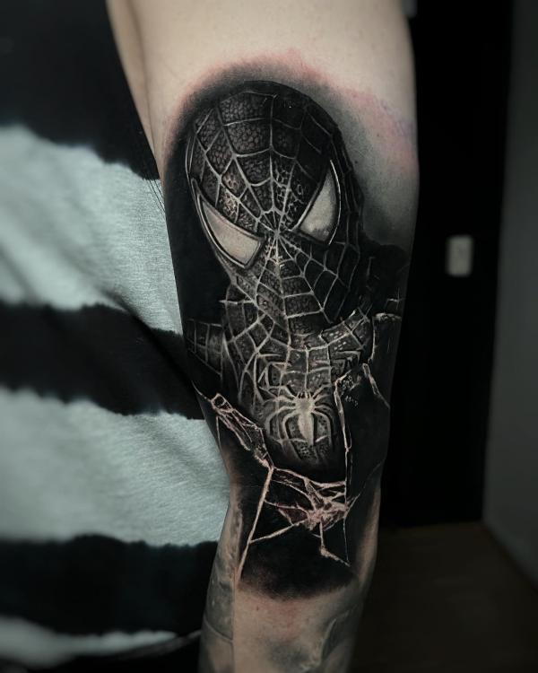 Blackout spider man tattoo forearm