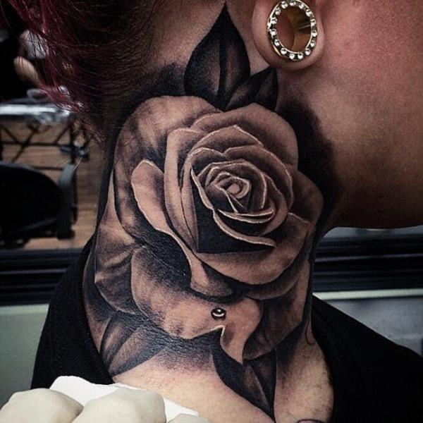 Bold rose neck tattoo black and white