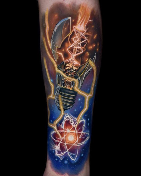 Bulb and galaxy with flame tattoo