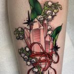 Crystal and white lily of the valley tattoo