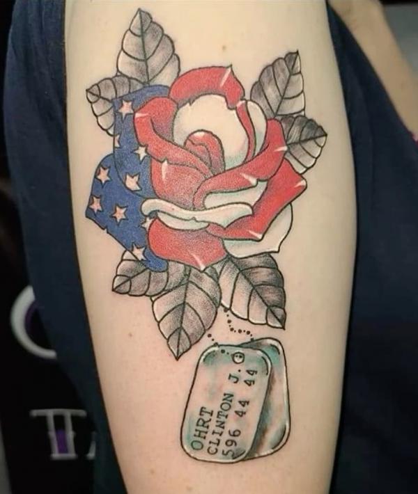 Dog tag and American flag rose tattoo