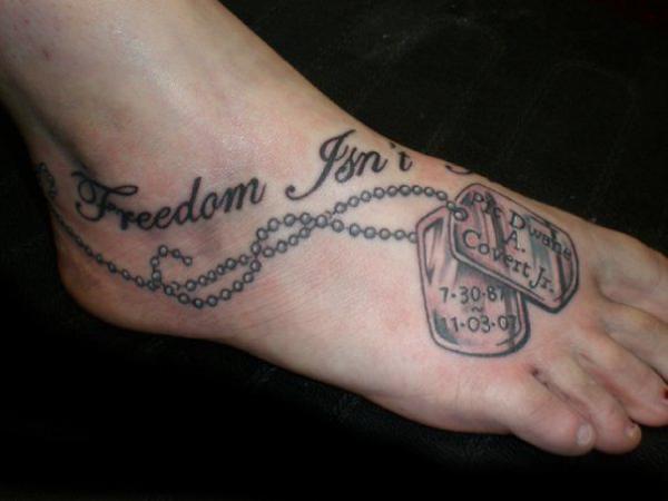 Dog tag foot tattoo