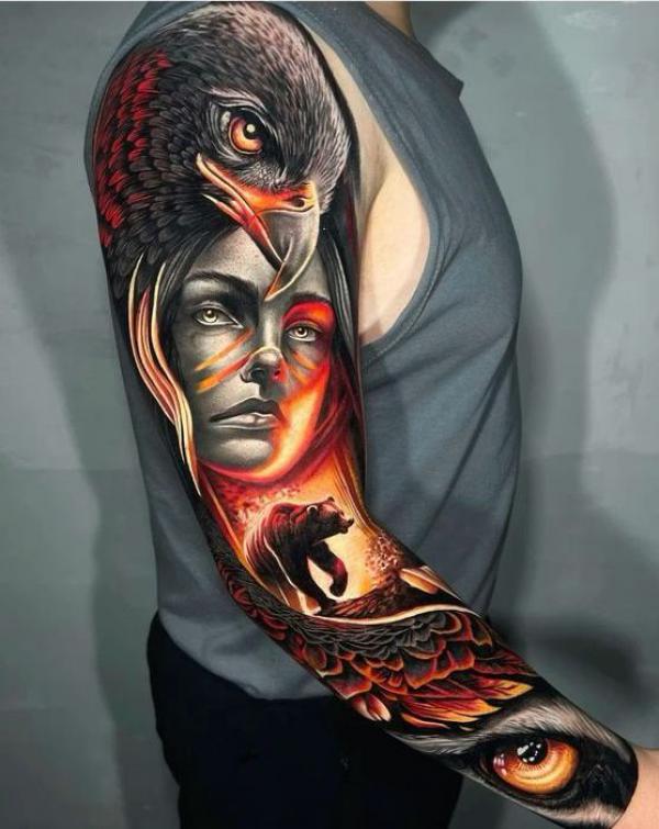 Eagle with lady and bear in flame tattoo sleeve