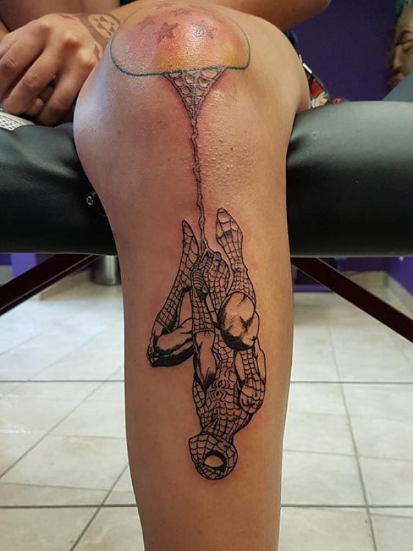 Fine line spider man tattoo leg
