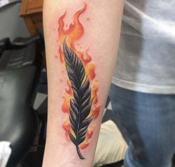 Fire and feather tattoo
