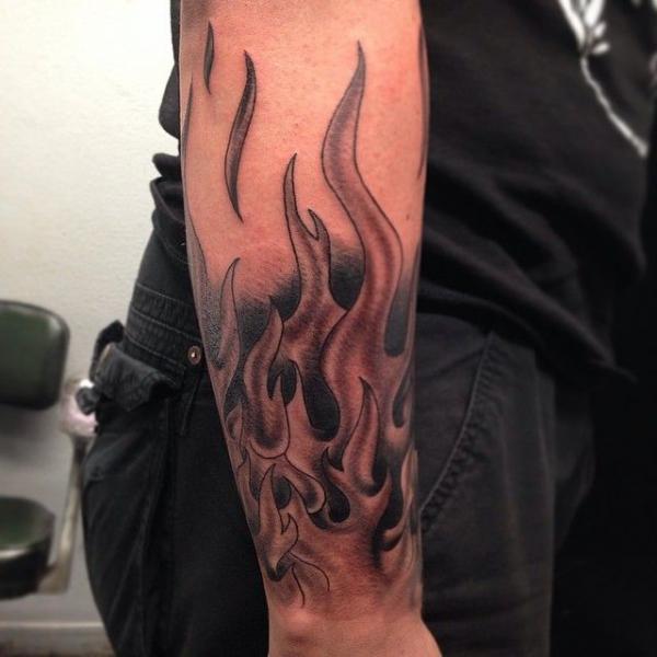 Fire tattoo forearm