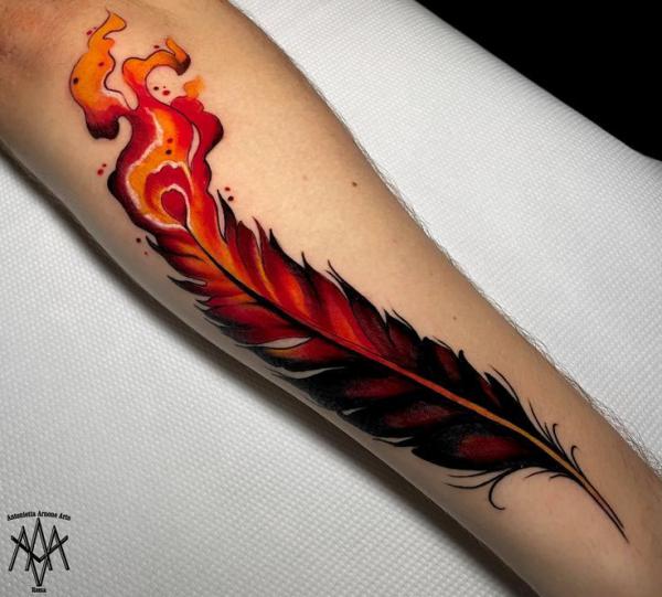 Firing feather forearm tattoo