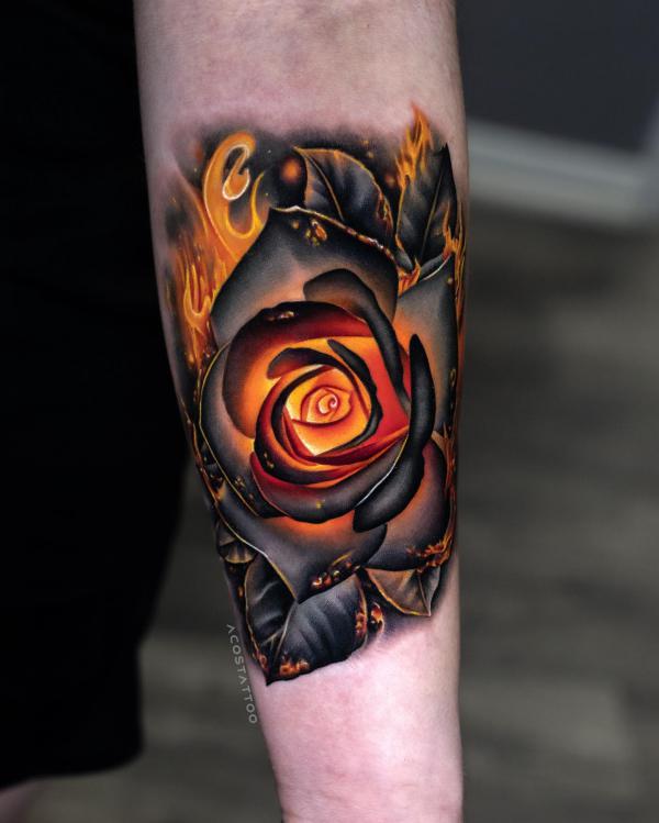 Firing rose tattoo forearm