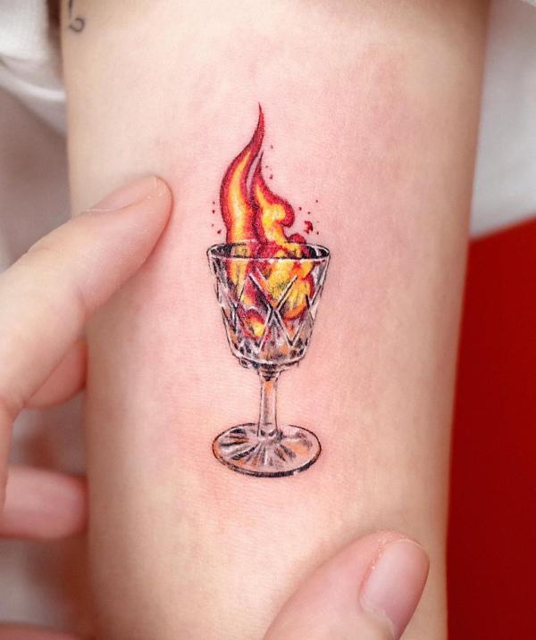 Flame in glass tattoo