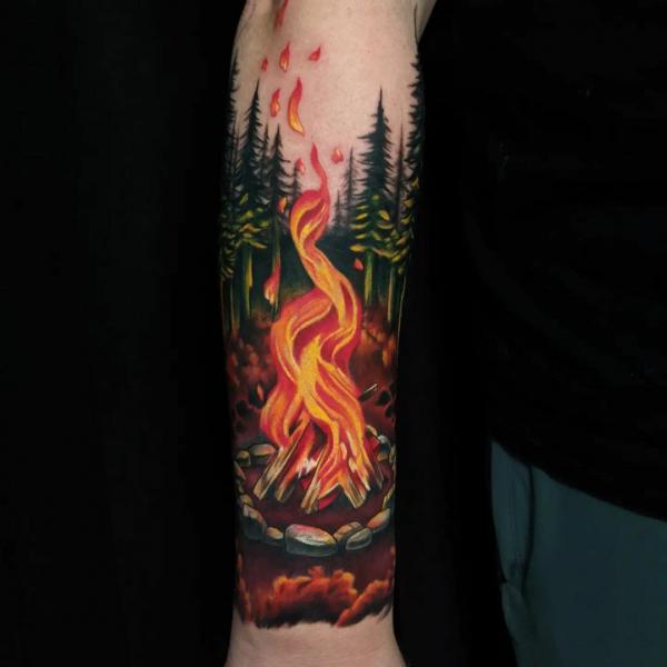 Forest and camp fire tattoo forearm
