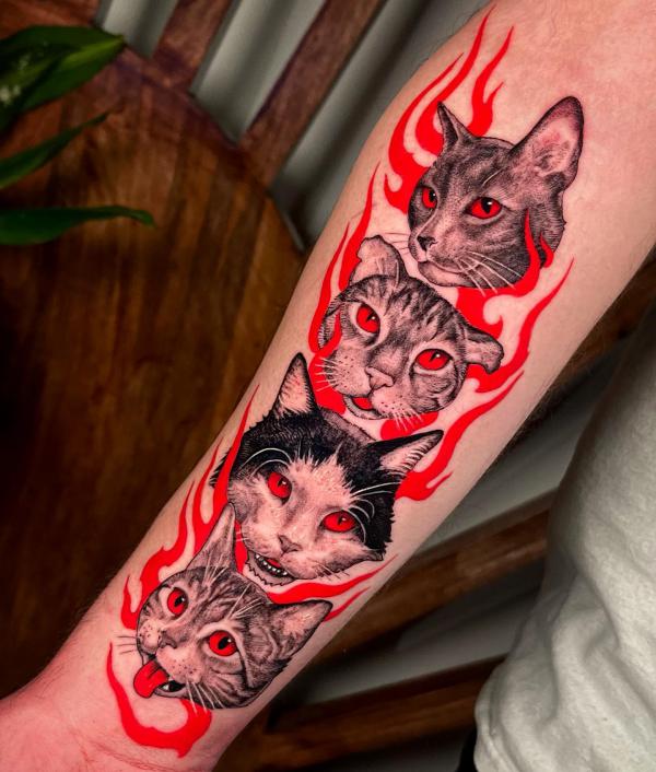 Four cats in flame tattoo sleeve