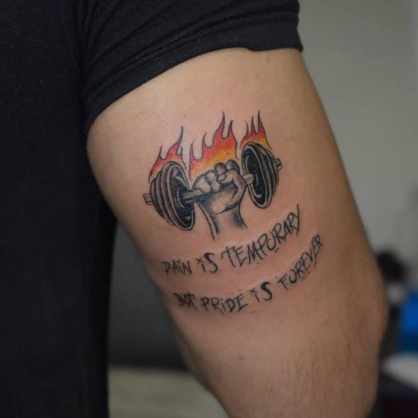 Holding firing dumbbells tattoo with quote pain is temporary pride is forever
