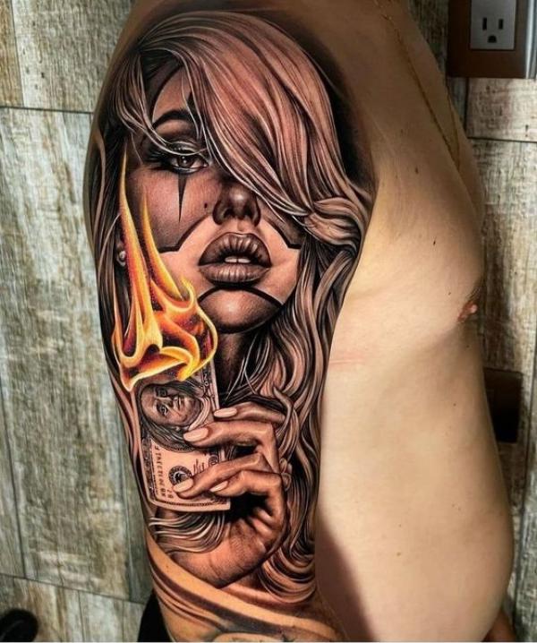 Lady with money in flame tattoo half sleeve