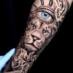 Lion king and clock with eye and smoke tattoo