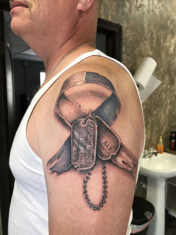 Marine dog tags with cancer ribbon tattoo