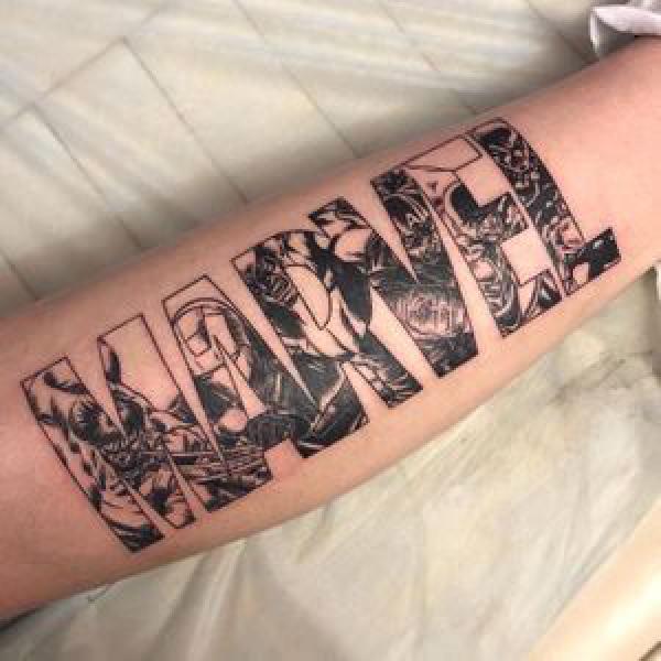 Marvel with spider man tattoo on arm