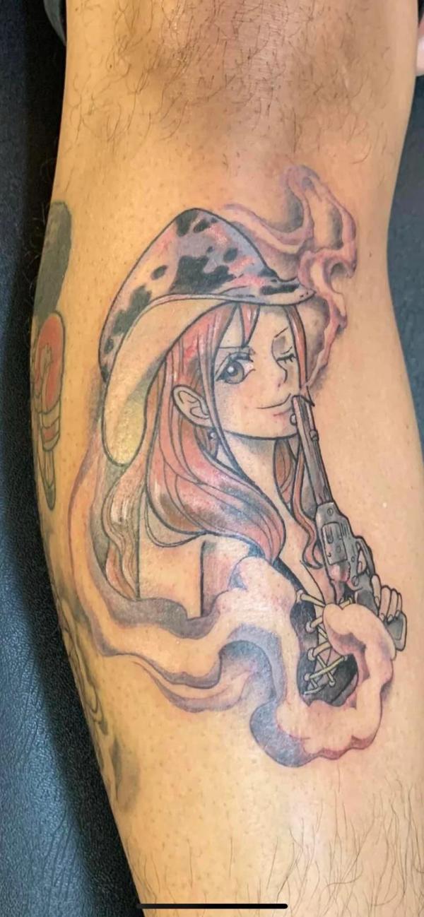 Nami with a gun tattoo