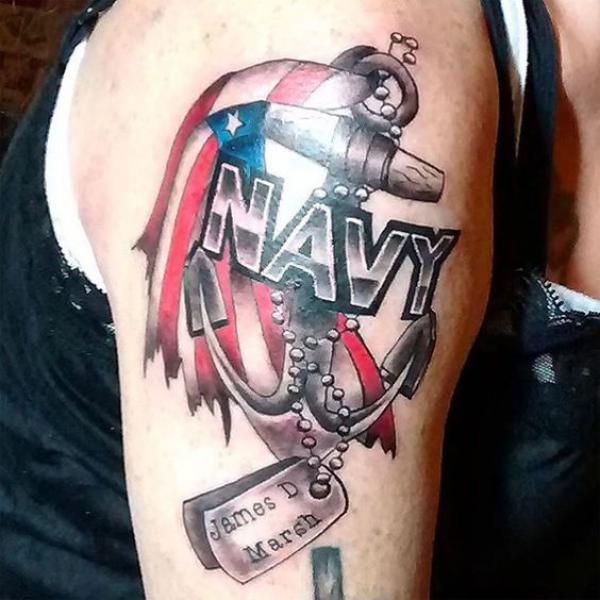 Navy anchor with dog tag and American flag tattoo