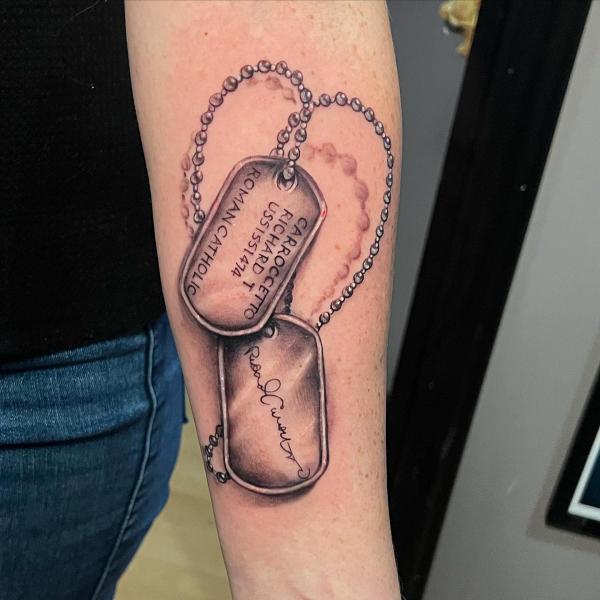 Realistic dog tag tattoo forearm