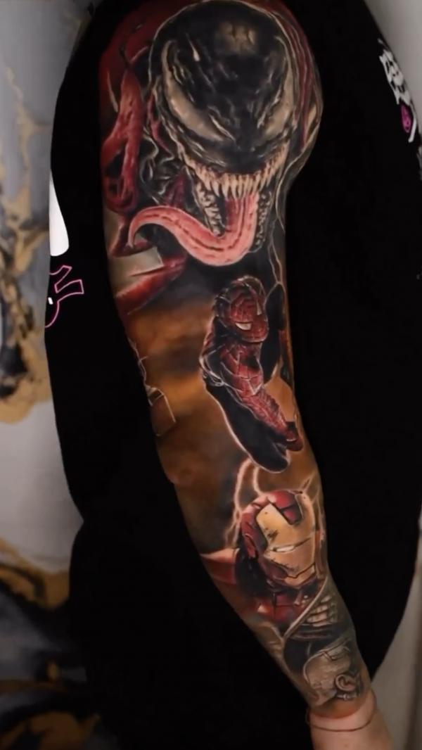 Realistic venom spider man iron man tattoo sleeve