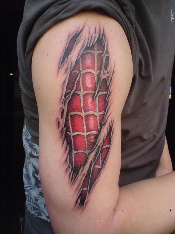 Ripper skin Spider Man web tattoo on upper arm