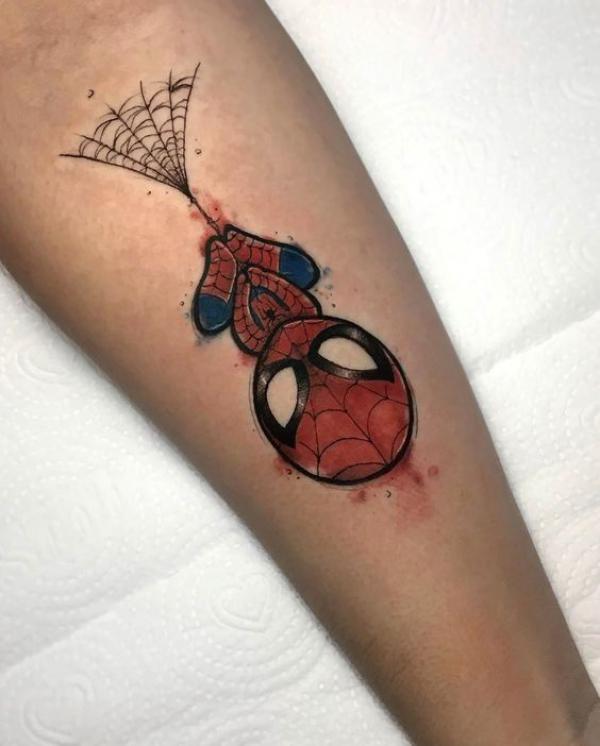 Small Spider Man tattoo on forearm
