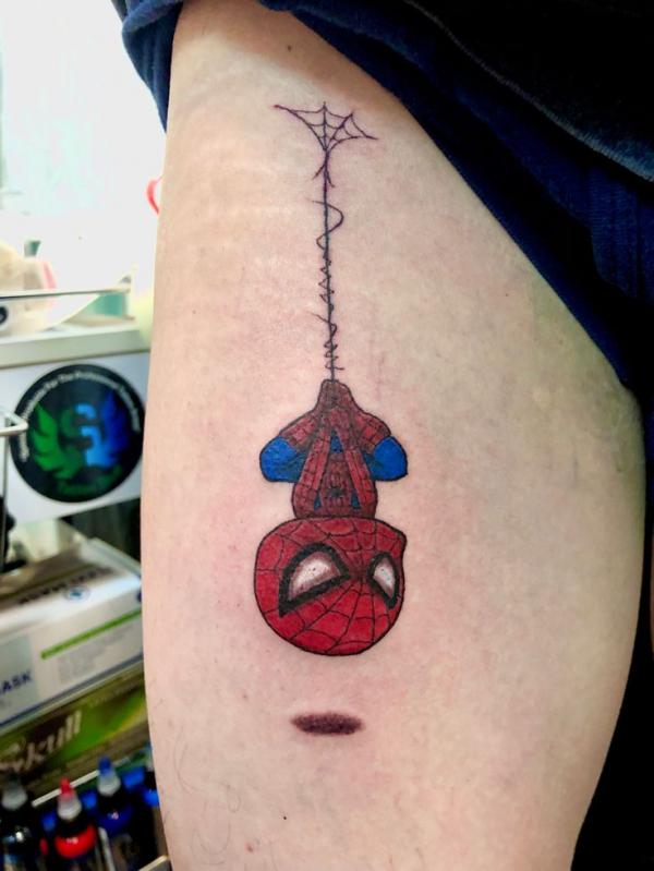 Small hanging Spider Man tattoo
