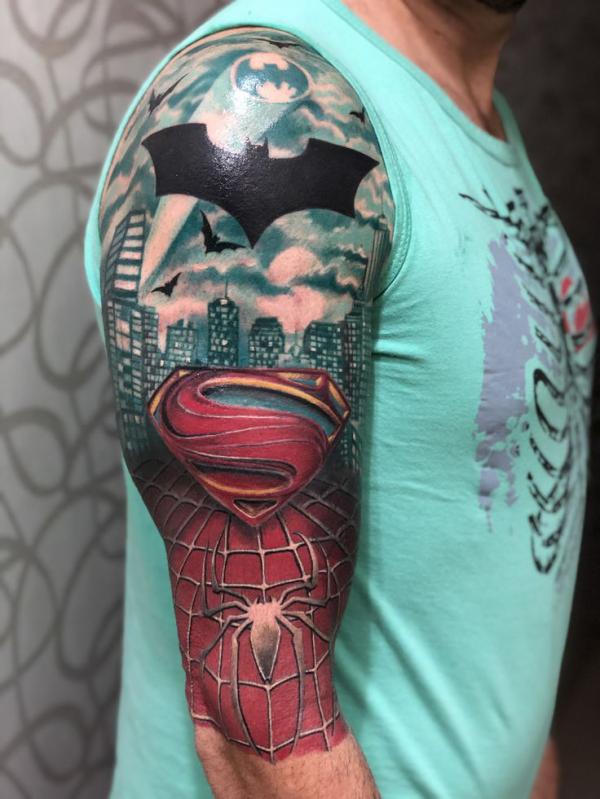 Spider man log and city tattoo half sleeve