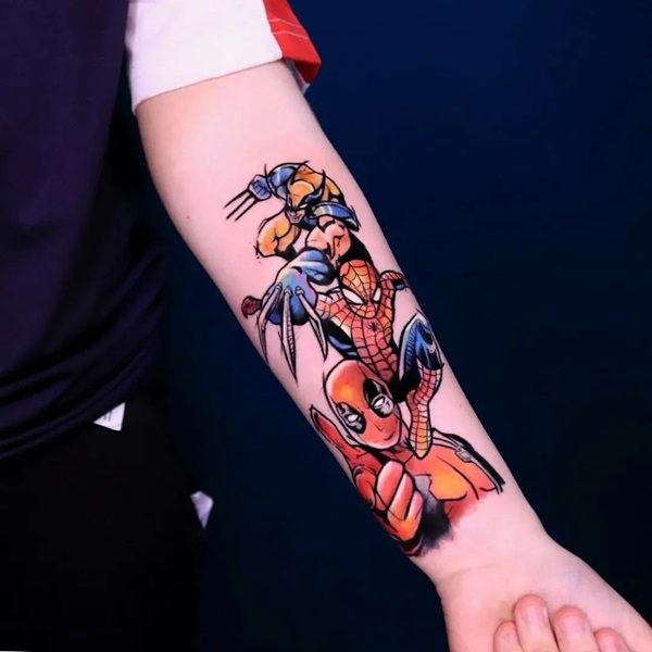 Spiderman and Wolverine tattoo forearm