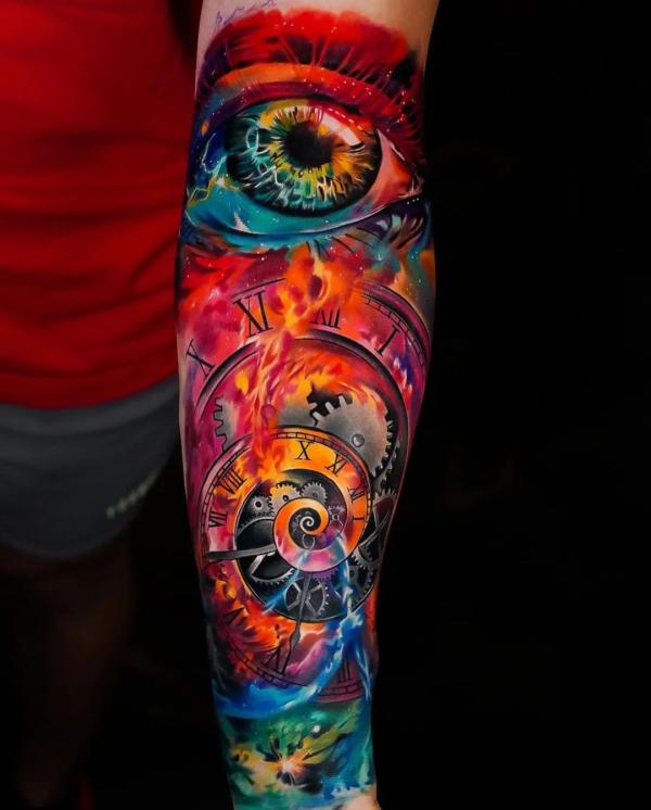 Spiral clock and realistic eye in flame tattoo sleeve