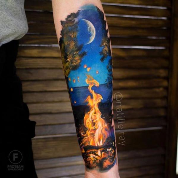 bonfire under moonlit tattoo forearm