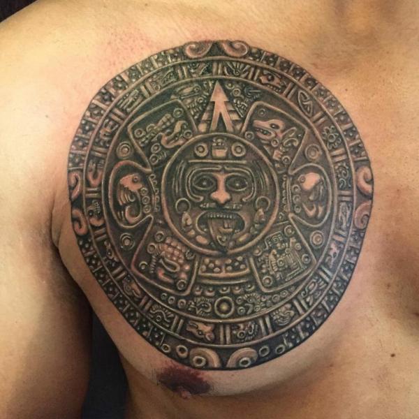 Aztec calendar stone chest tattoo