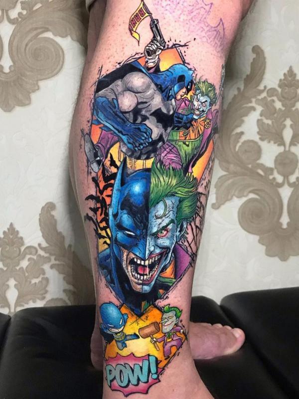 Batman and joker on lower leg tattoo