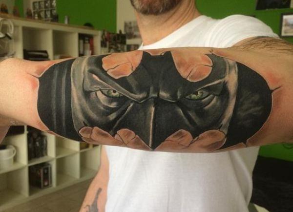 Batman log tattoo forearm