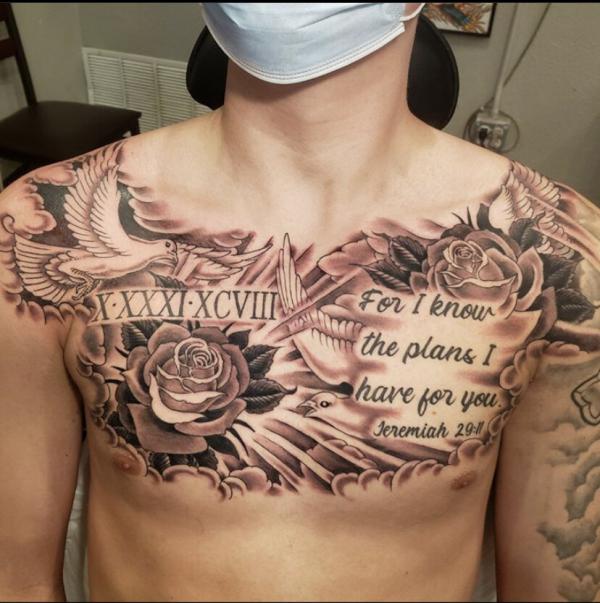 Bible verse Jeremiah 29 11 with bird and rose chest tattoo