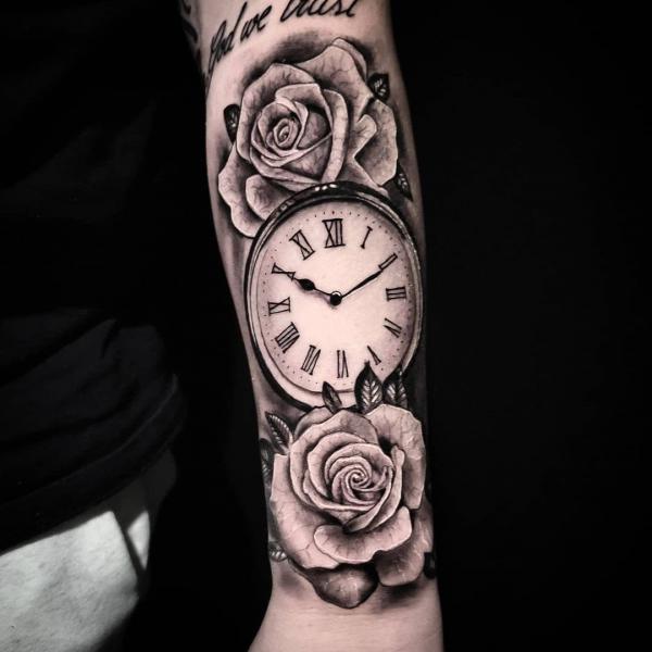 Black and grey rose and clock forearm tattoo