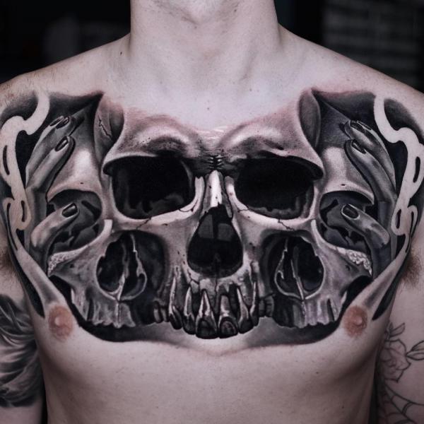 Black and white skull tattoo chest