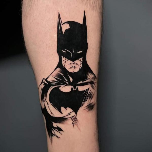 Black ink batman tattoo forearm