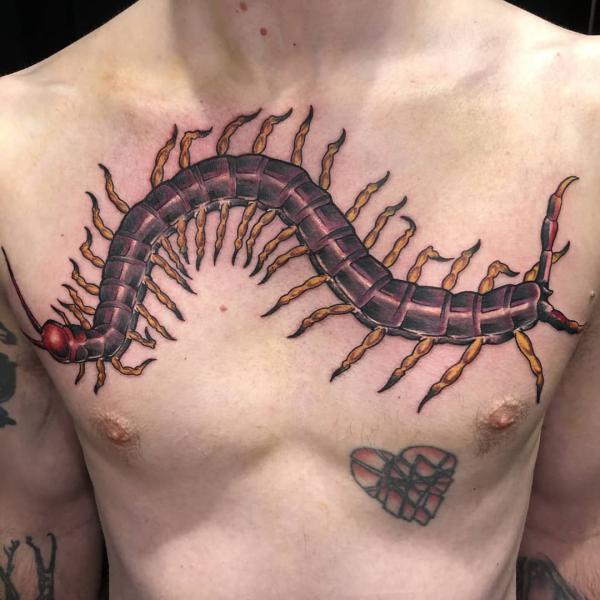 Centipede chest tattoo