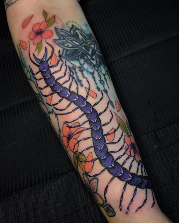 Centipede with flowers tattoo