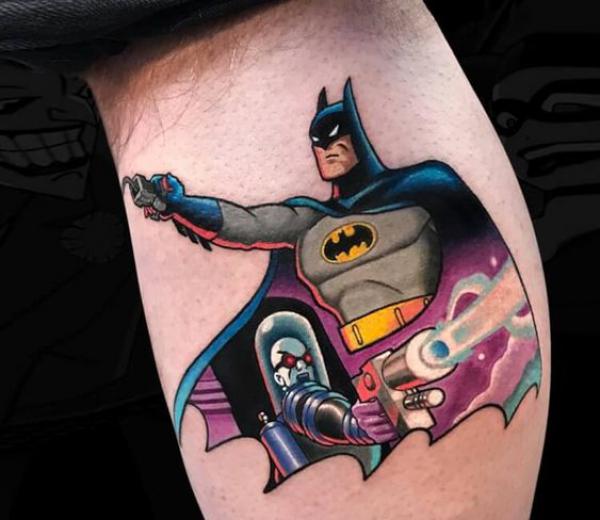 Colored batman tattoo bicep