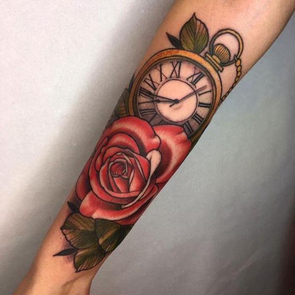 Colored vintage pocket watch and rose tattoo