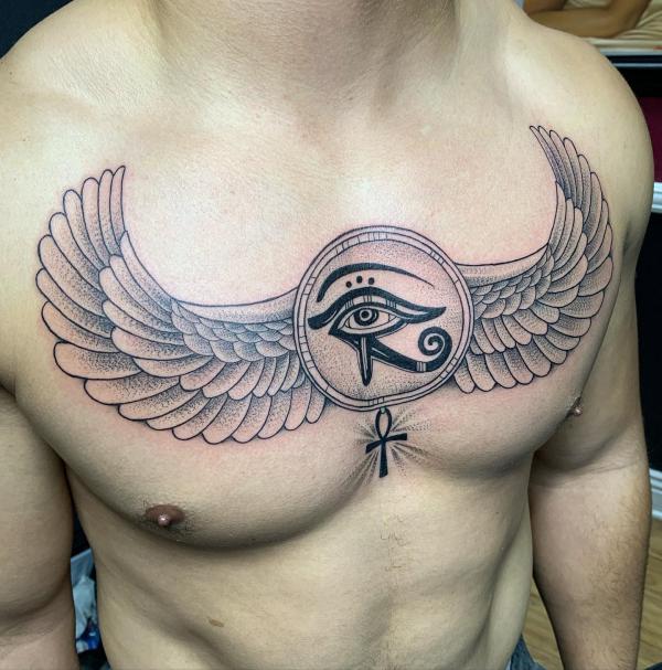 Eye of horus with wings chest tattoo with Ankh symbol
